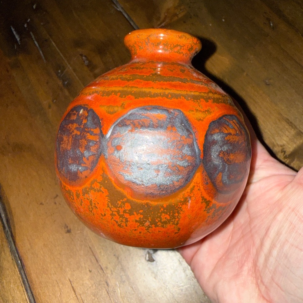small vintage Japanese studio pottery vase featuring a geometric circle